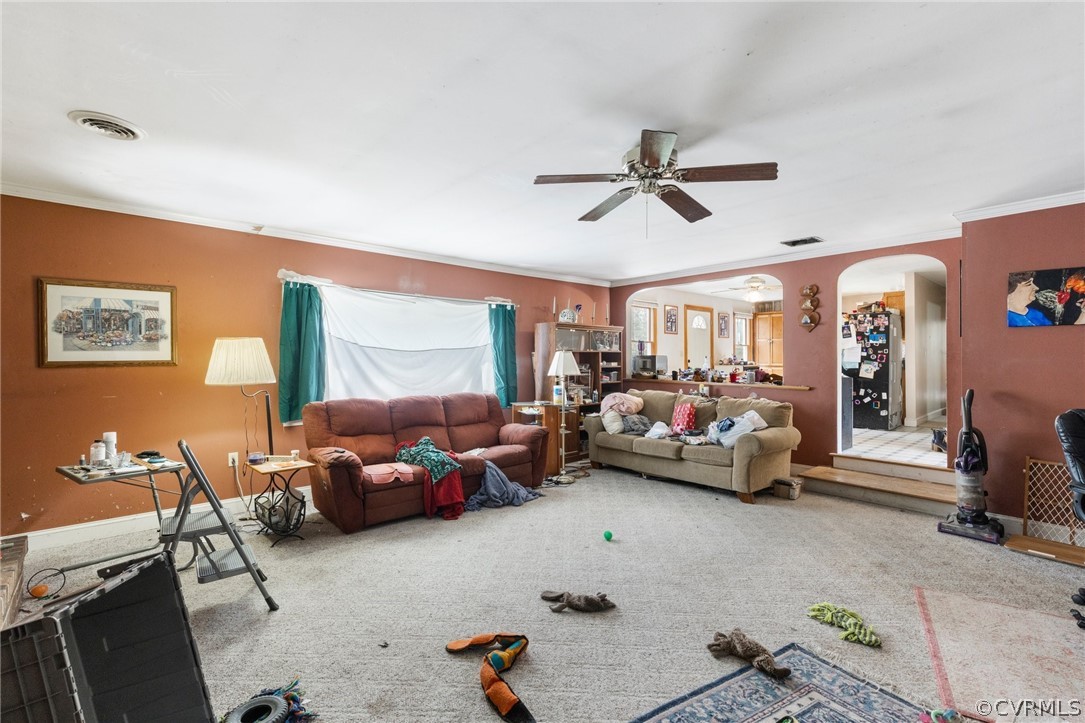 8442 Wheeling Road Mechanicsville, VA 23116 - Photo 9 of 23 a living room with furniture and a ceiling fan