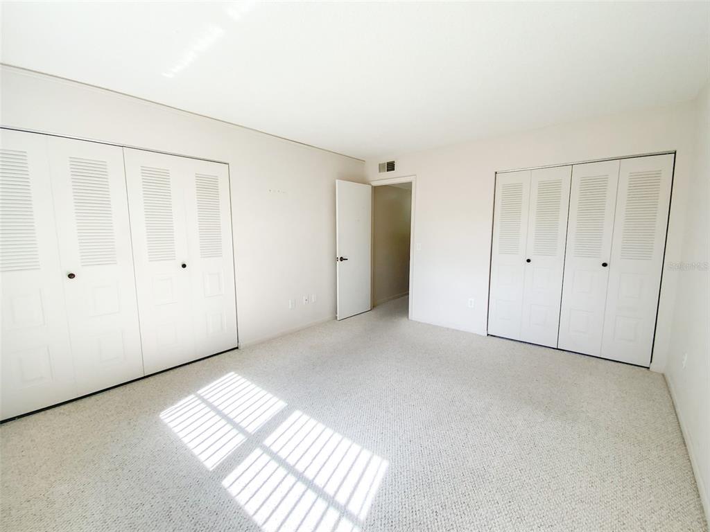 1370 Heather Ridge Boulevard, Unit 204 Dunedin, FL 34698 - Photo 14 of 37 a view of an empty room