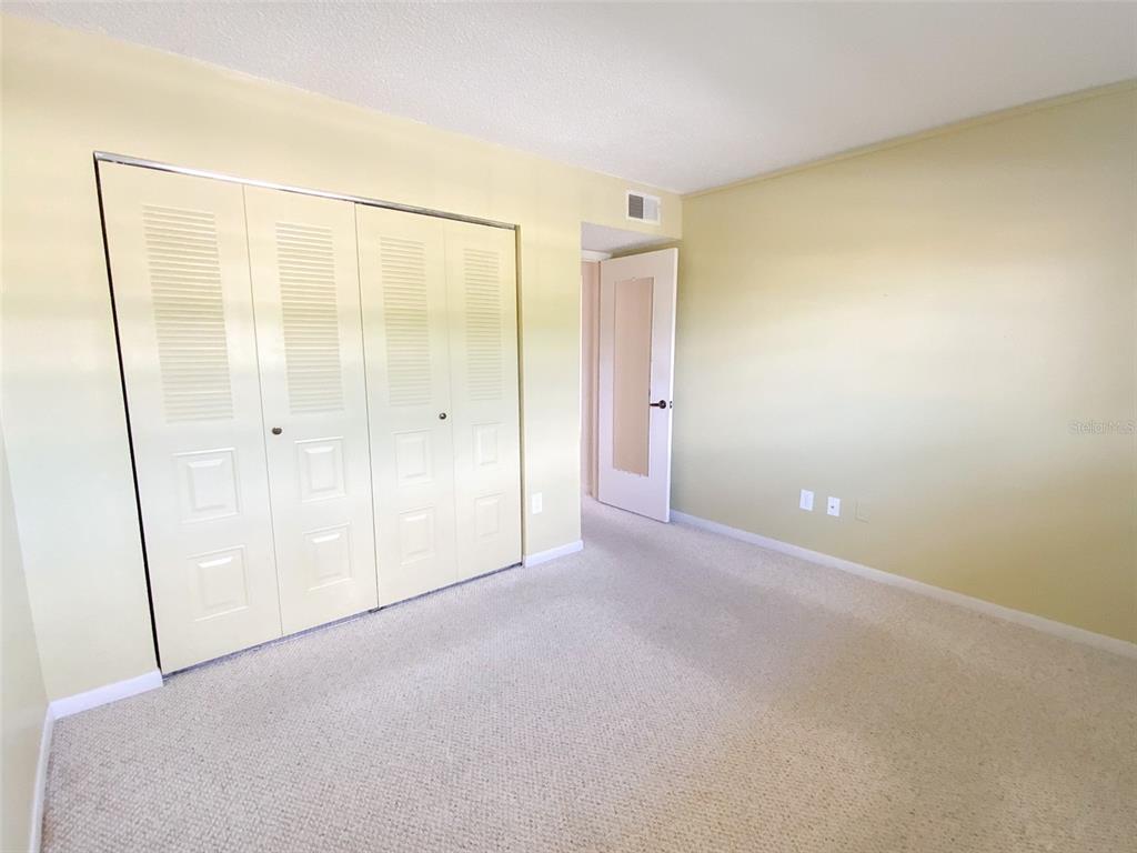 1370 Heather Ridge Boulevard, Unit 204 Dunedin, FL 34698 - Photo 19 of 37 a view of an empty room