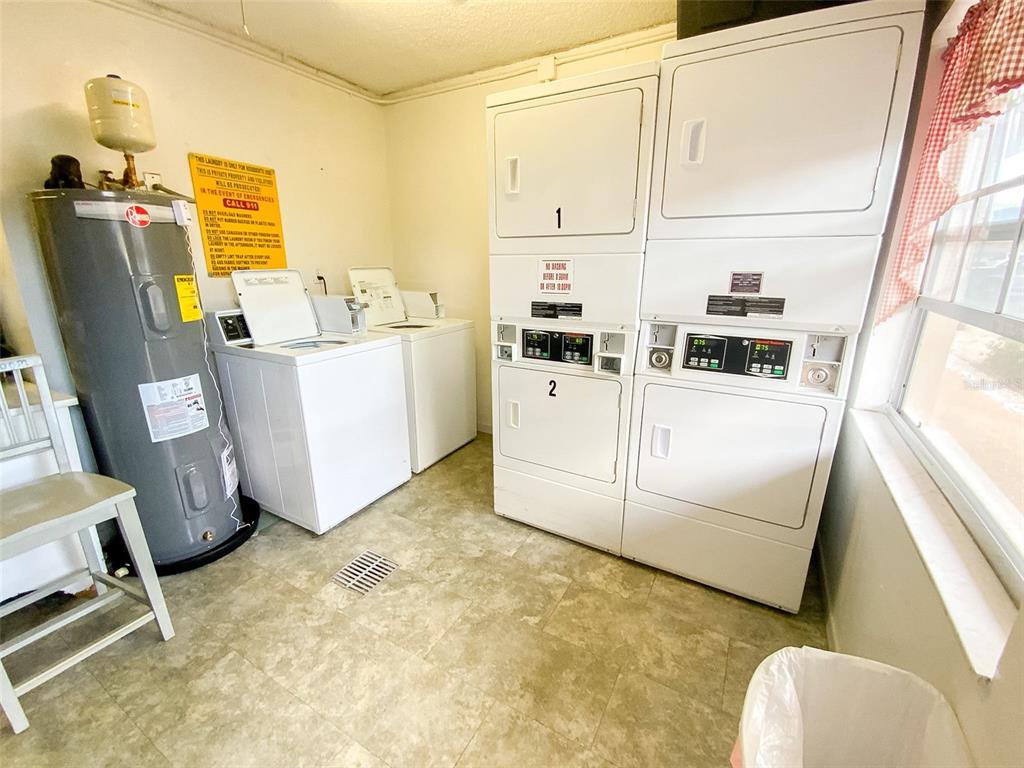 1370 Heather Ridge Boulevard, Unit 204 Dunedin, FL 34698 - Photo 28 of 37 a room with storage and utility