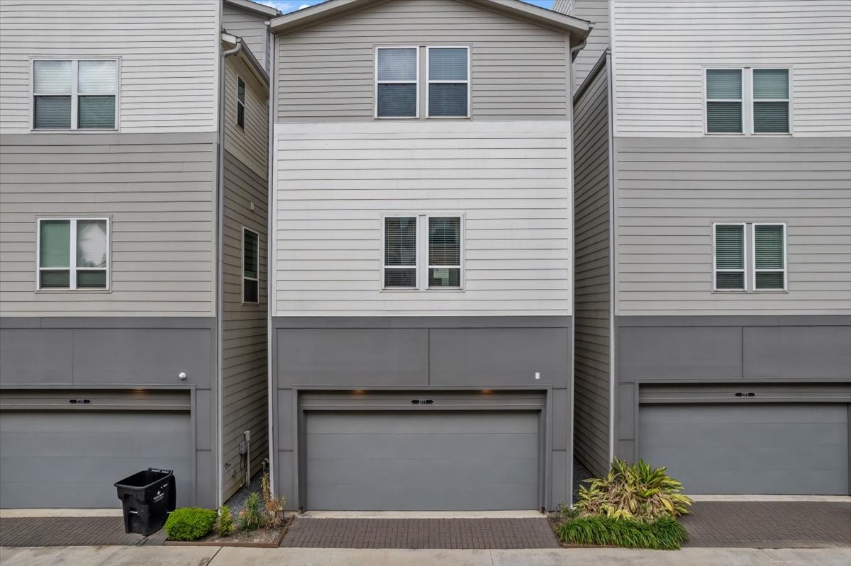 2777 Clinton Drive Houston, TX 77020 - Photo 31 of 37 This photo shows a modern townhouse with a two-car garage.