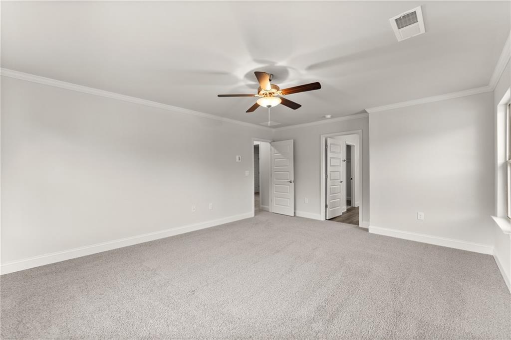 484 Magnolia Grove Place Cornelia, GA 30531 - Photo 24 of 35 a view of a big room with carpet