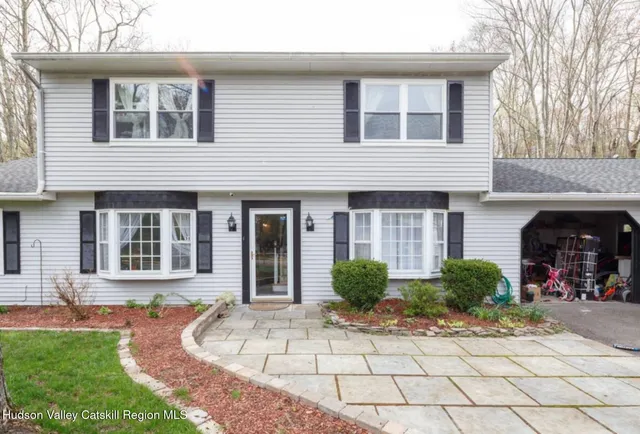 a front view of a house with entryway