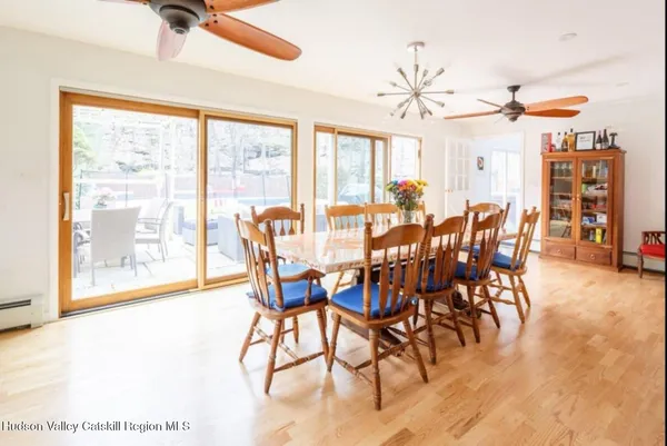 a view of a dining room with furniture window and outside view