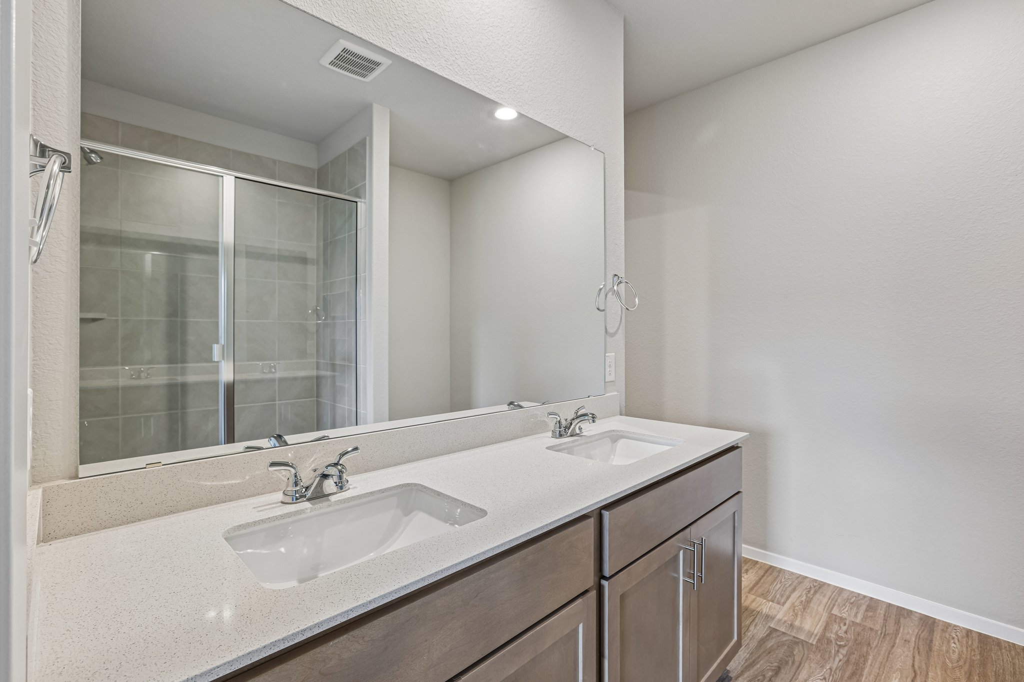 5513 Sacra Cove Austin, TX 78747 - Photo 20 of 37 a bathroom with a sink mirror and vanity