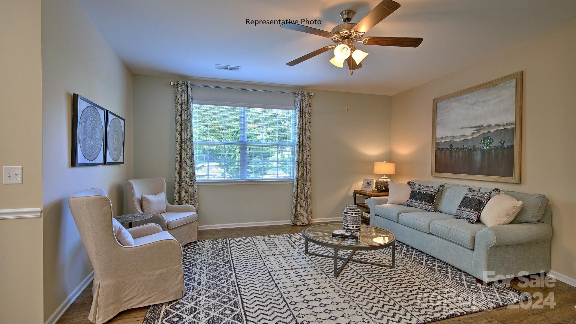 3779 Charles Street Northwest Conover, NC 28613 - Photo 17 of 36 a living room with furniture and a window