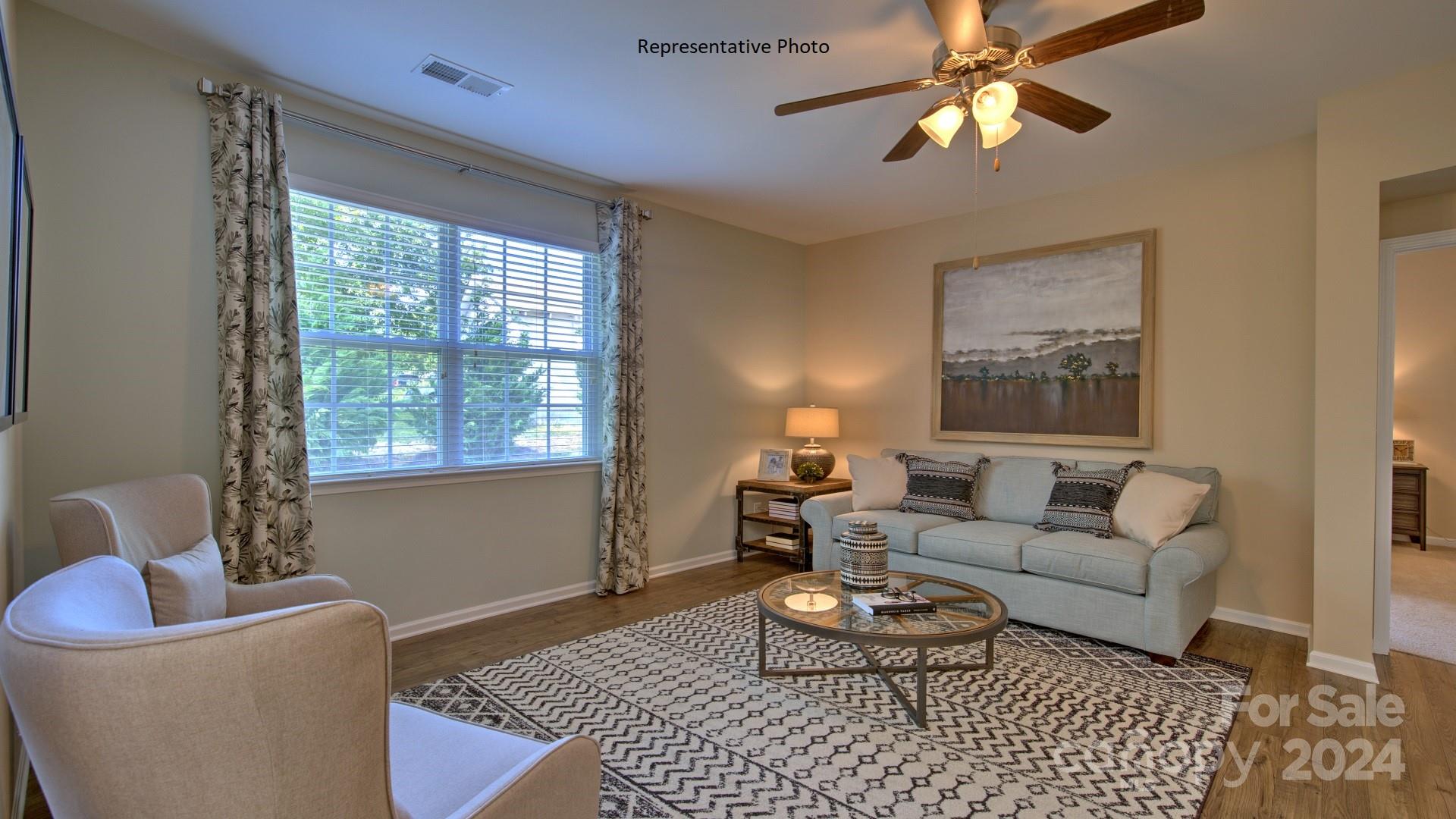 3779 Charles Street Northwest Conover, NC 28613 - Photo 19 of 36 a living room with furniture and a window