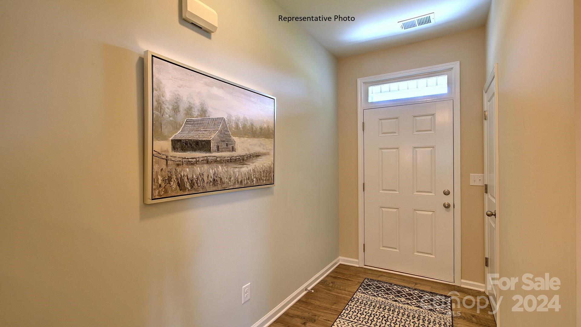 3779 Charles Street Northwest Conover, NC 28613 - Photo 2 of 36 a view of a hallway with paintings on the wall