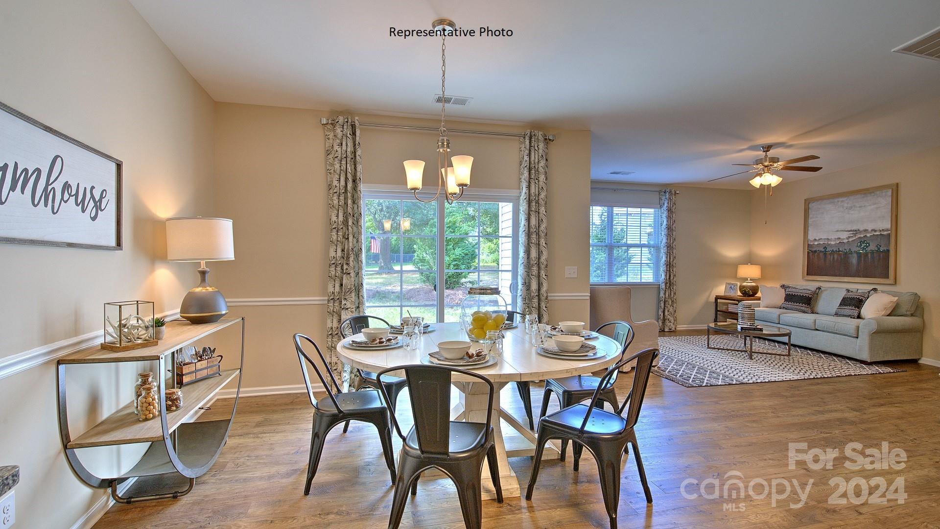 3779 Charles Street Northwest Conover, NC 28613 - Photo 7 of 36 a view of a dining room with furniture window and outside view