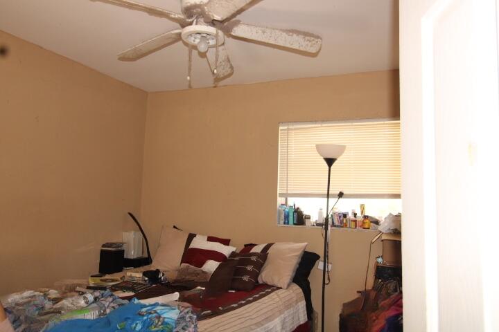 1501 West 11th Street Riviera Beach, FL 33404 - Photo 9 of 10 a living room with furniture and a window