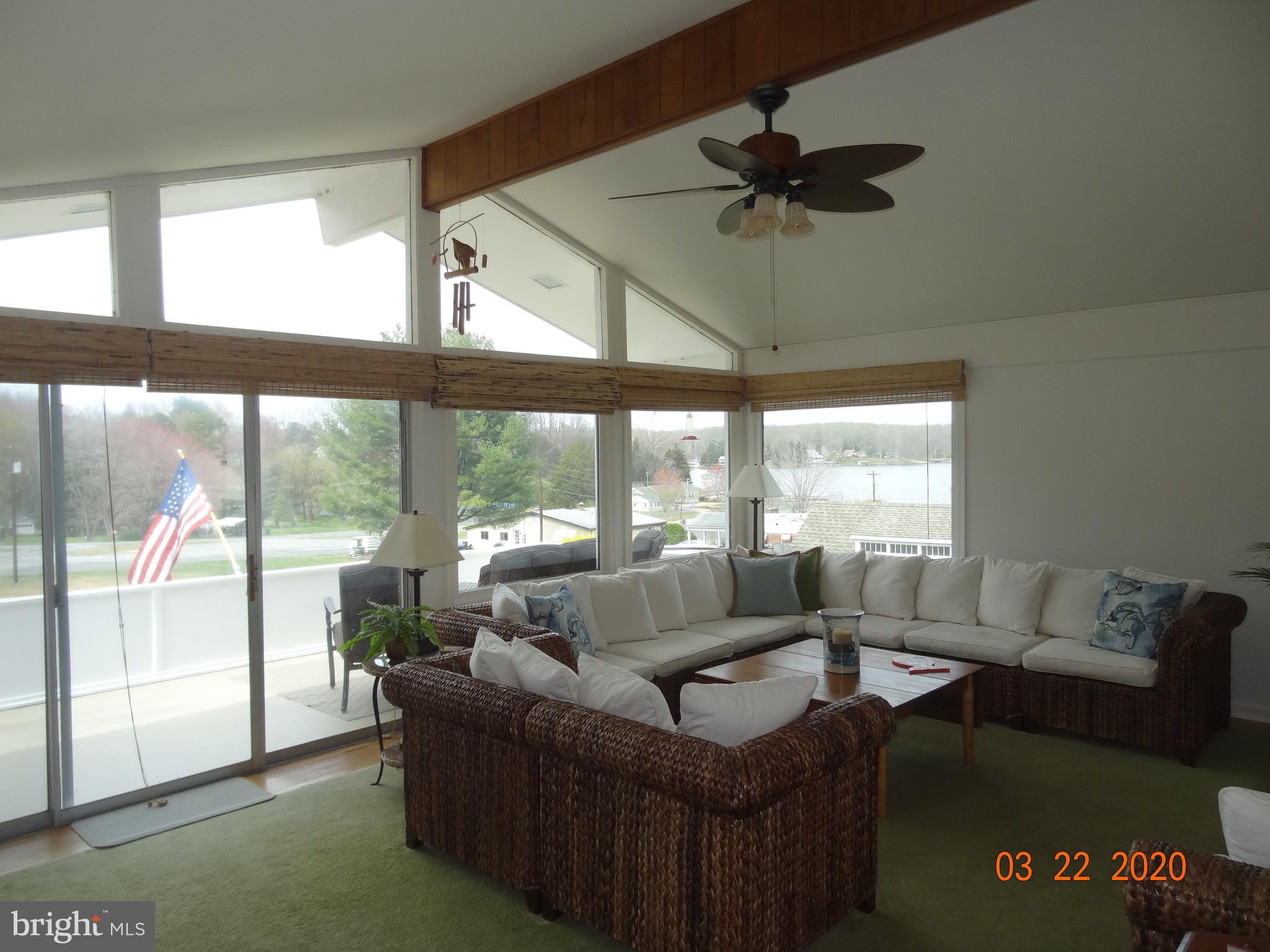 71 Fairview Road Louisa, VA 23093 - Photo 18 of 101 Wall Full of Windows and Wood Floors on Main Level
