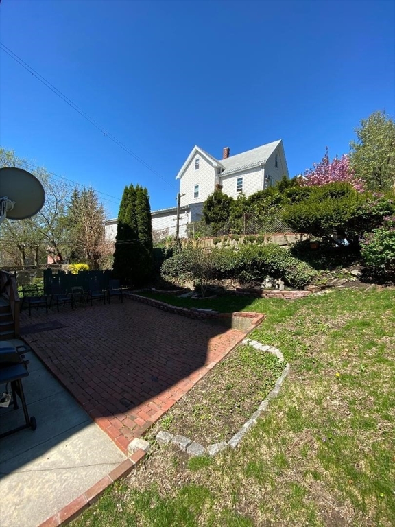 29 Cameron Avenue, Unit 1 Somerville, MA 02144 - Photo 14 of 16 a view of a swimming pool with a yard