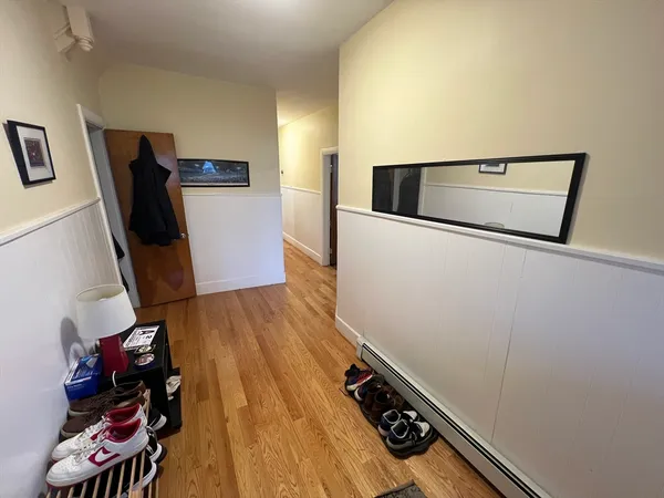 a view of workspace with wooden floor