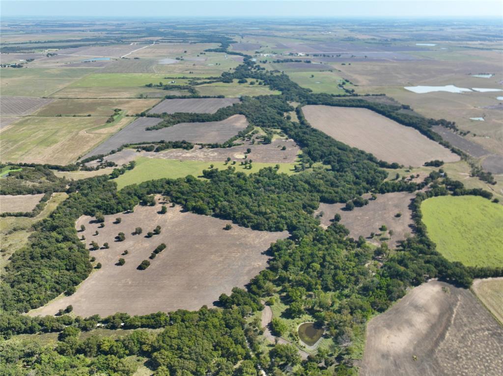 329 Lowell Road Milford, TX 76670 - Photo 18 of 40 an aerial view of ocean with residential house and outdoor space