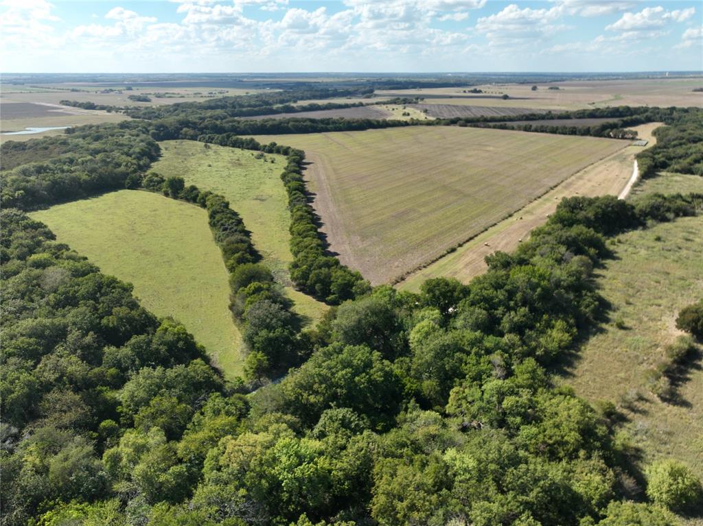 329 Lowell Road Milford, TX 76670 - Photo 21 of 40 an aerial view of ocean with residential house and outdoor space