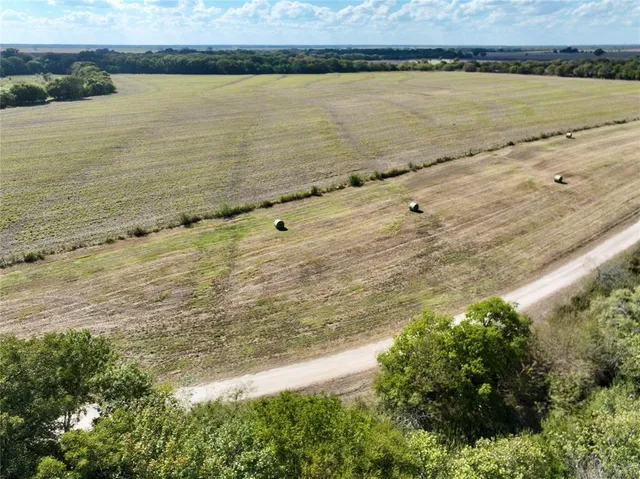 an aerial view of beach and ocean
