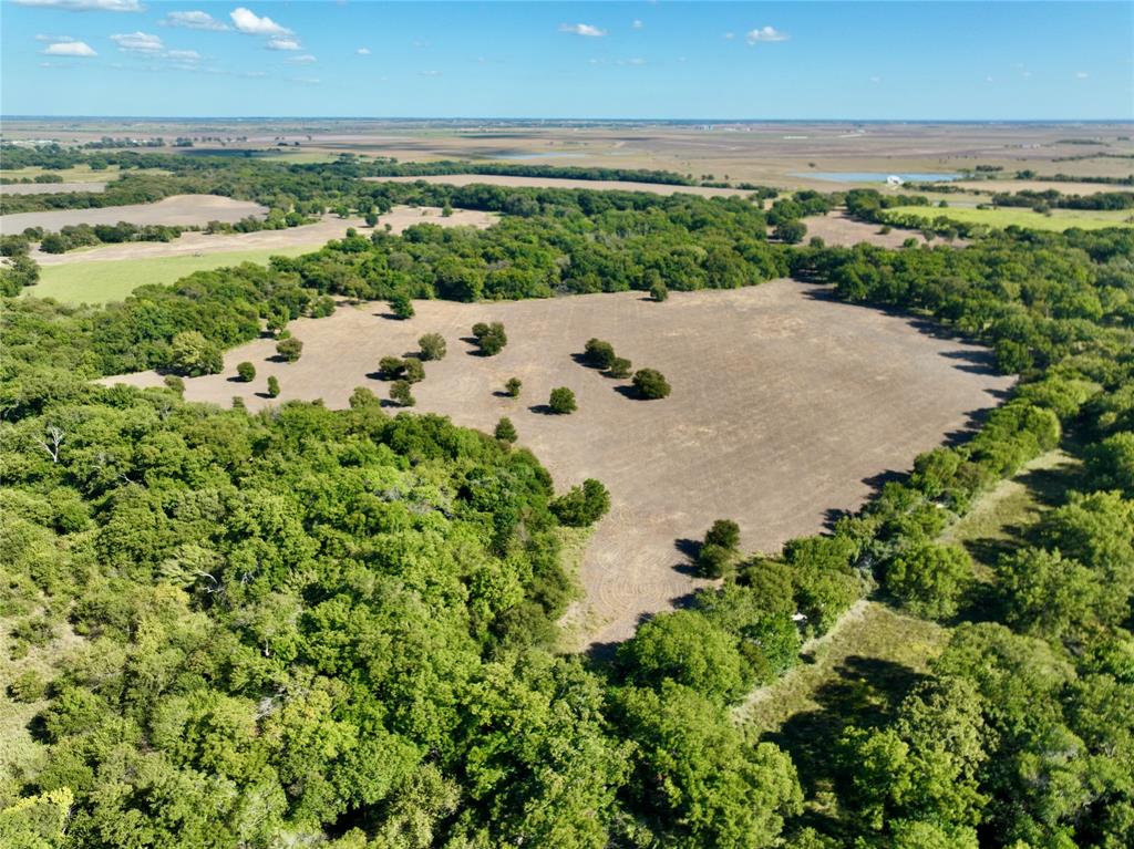 329 Lowell Road Milford, TX 76670 - Photo 27 of 40 an aerial view of a house with beach and ocean view