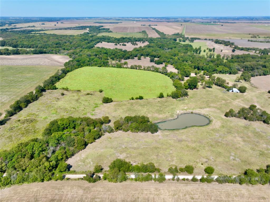 329 Lowell Road Milford, TX 76670 - Photo 31 of 40 a view of a lake with a beach