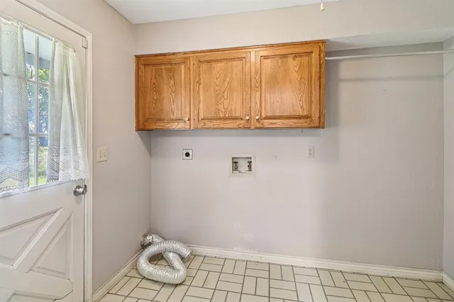 a bathroom with a granite countertop window and a shower