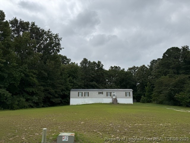 a view of a field with an outdoor space