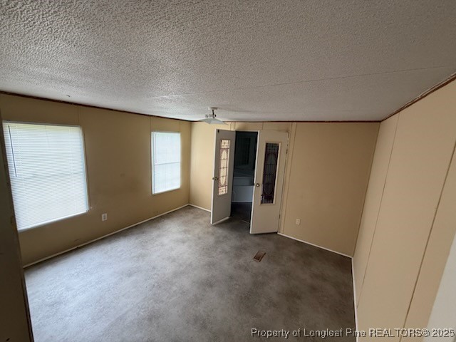 2828 Chimeny Brooke Road Fayetteville, NC 28312 - Photo 7 of 12 a view of an empty room with a window
