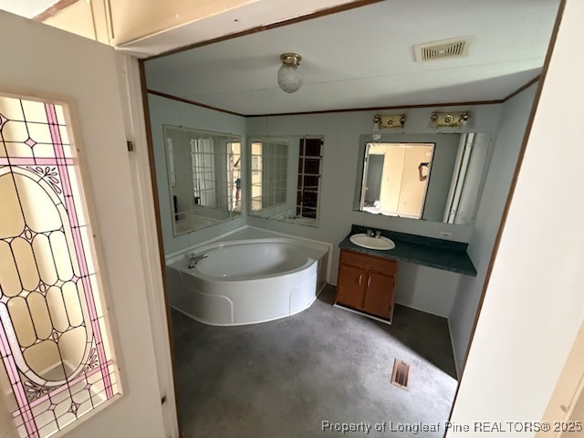 2828 Chimeny Brooke Road Fayetteville, NC 28312 - Photo 8 of 12 a spacious bathroom with a sink a mirror and bathtub