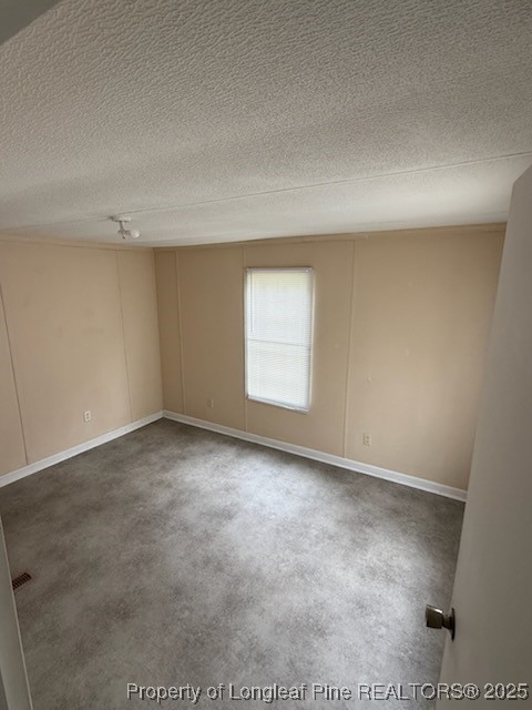 2828 Chimeny Brooke Road Fayetteville, NC 28312 - Photo 10 of 12 an empty room with a window