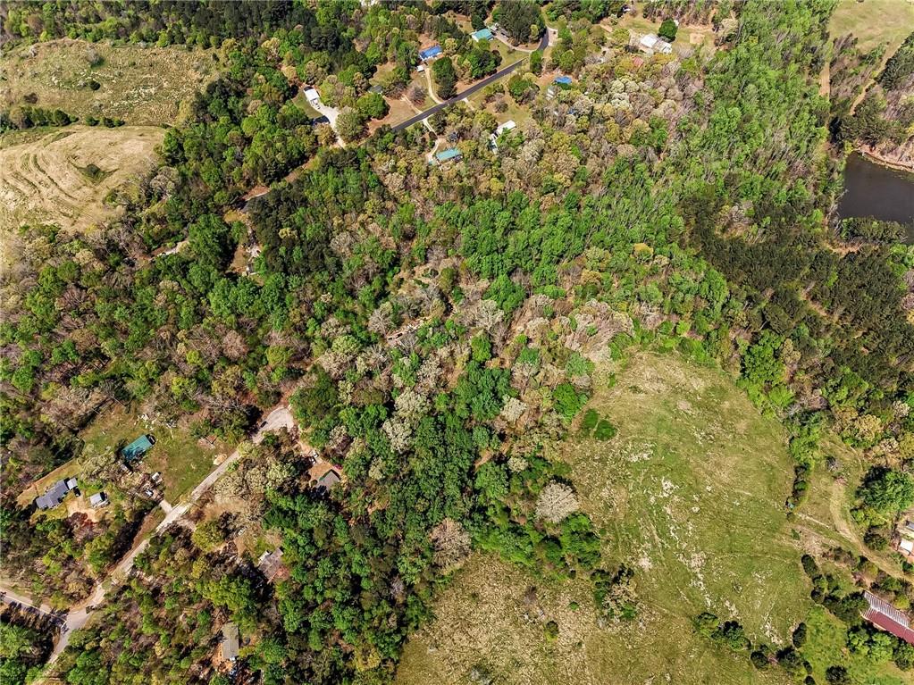 101 Birch Court Jefferson, GA 30549 - Photo 8 of 12 a view of a lush green field