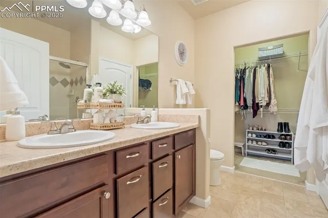 a bathroom with a sink a vanity and a mirror