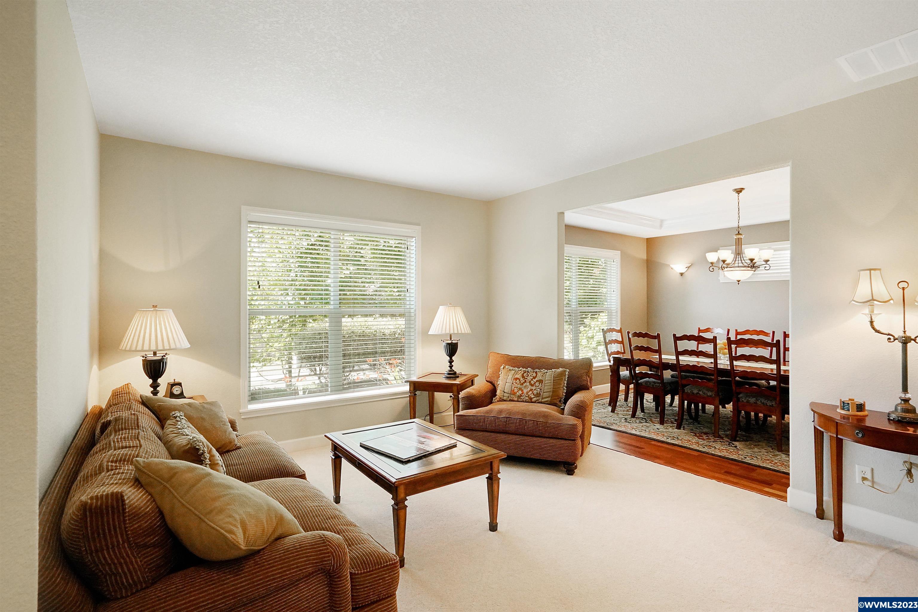 306 Northwest Reed Lane Dallas, OR 97338 - Photo 4 of 42 a living room with furniture and a large window