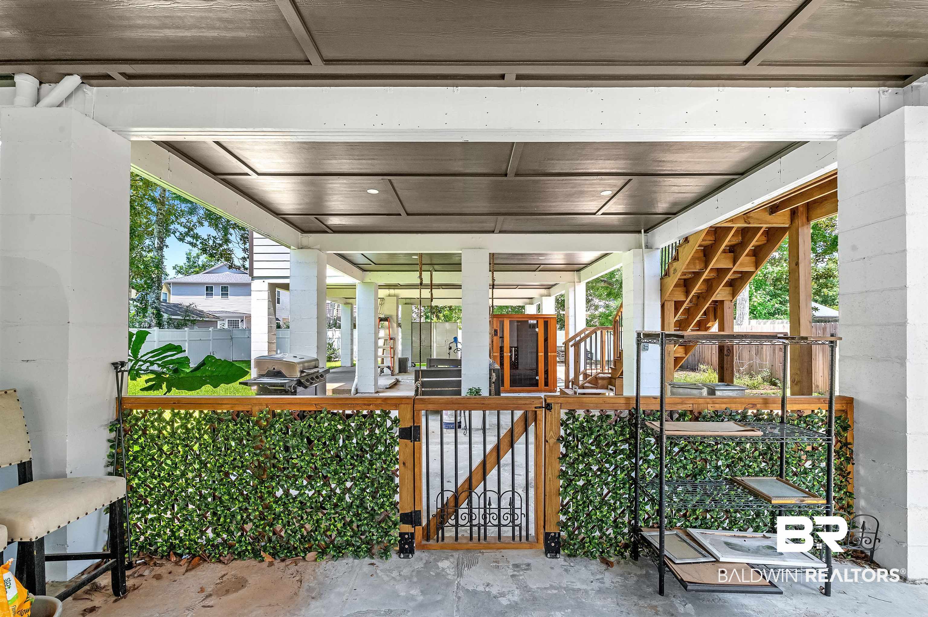 5215 Pine Road Orange Beach, AL 36561 - Photo 8 of 60 Porch featuring a gate and a grill