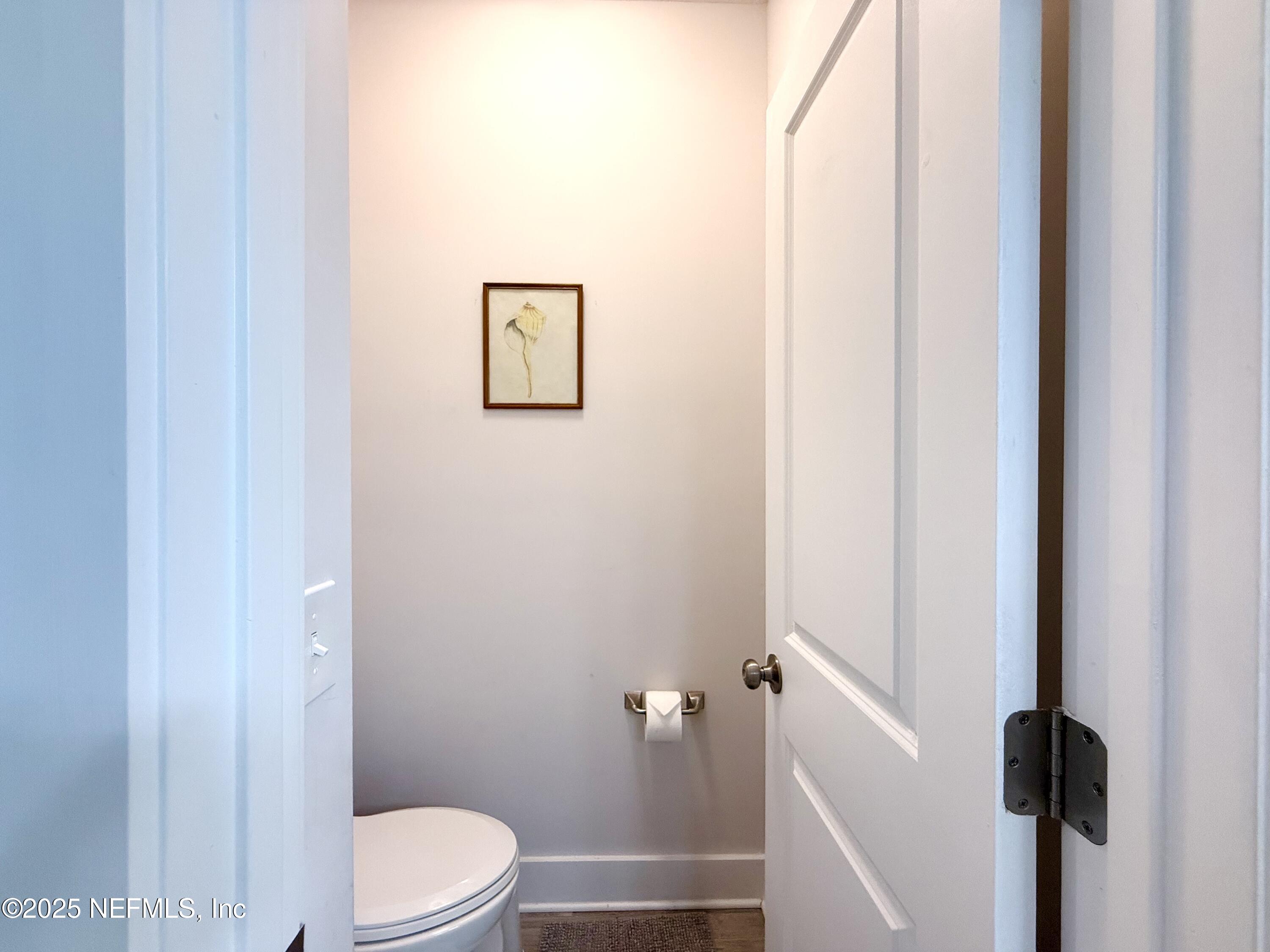 330 Trade Wind Lane St. Augustine, FL 32080 - Photo 17 of 46 a white toilet sitting next to a shower