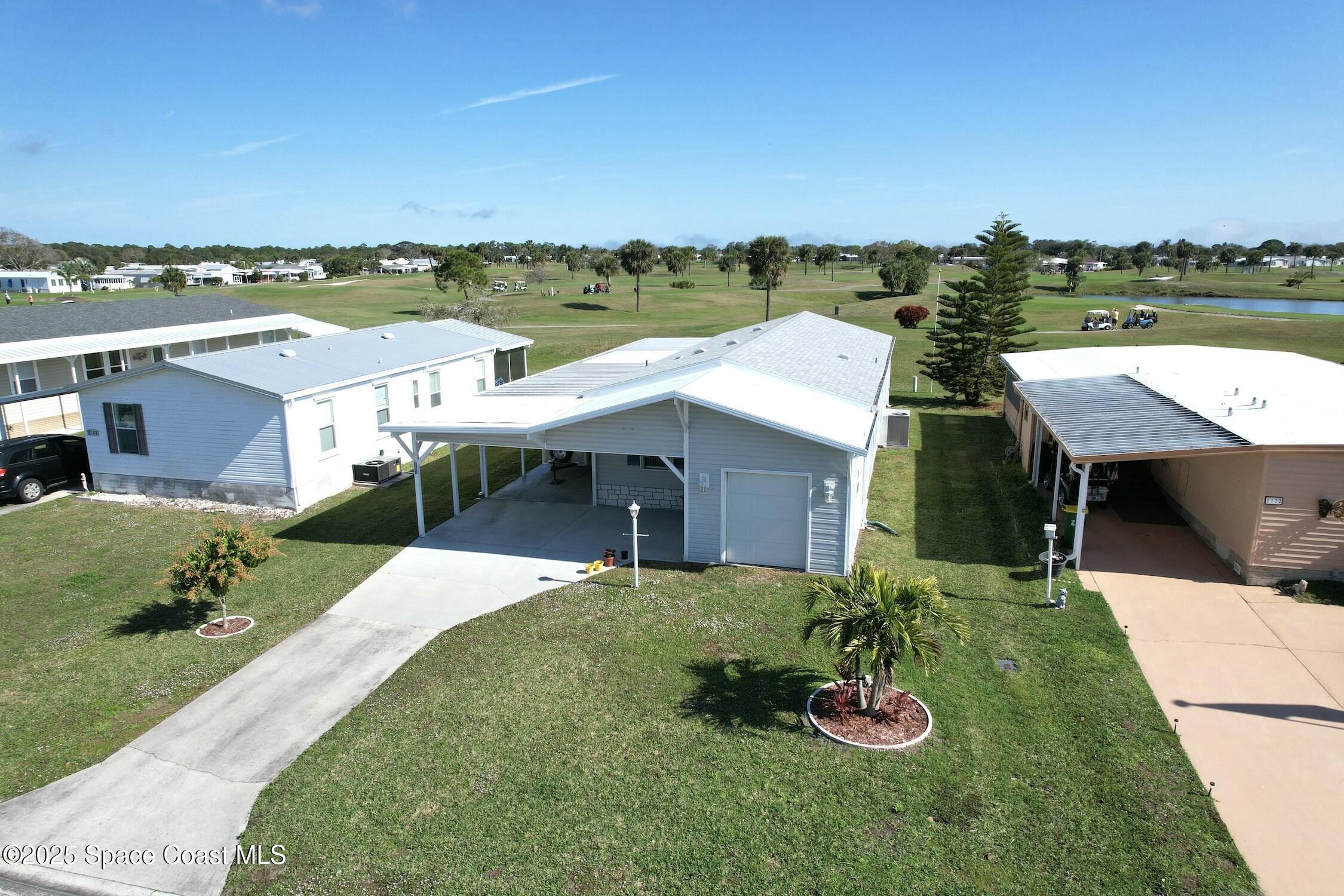 1124 Barefoot Circle Barefoot Bay, FL 32976 - Photo 1 of 79 tempImagemE9pqK