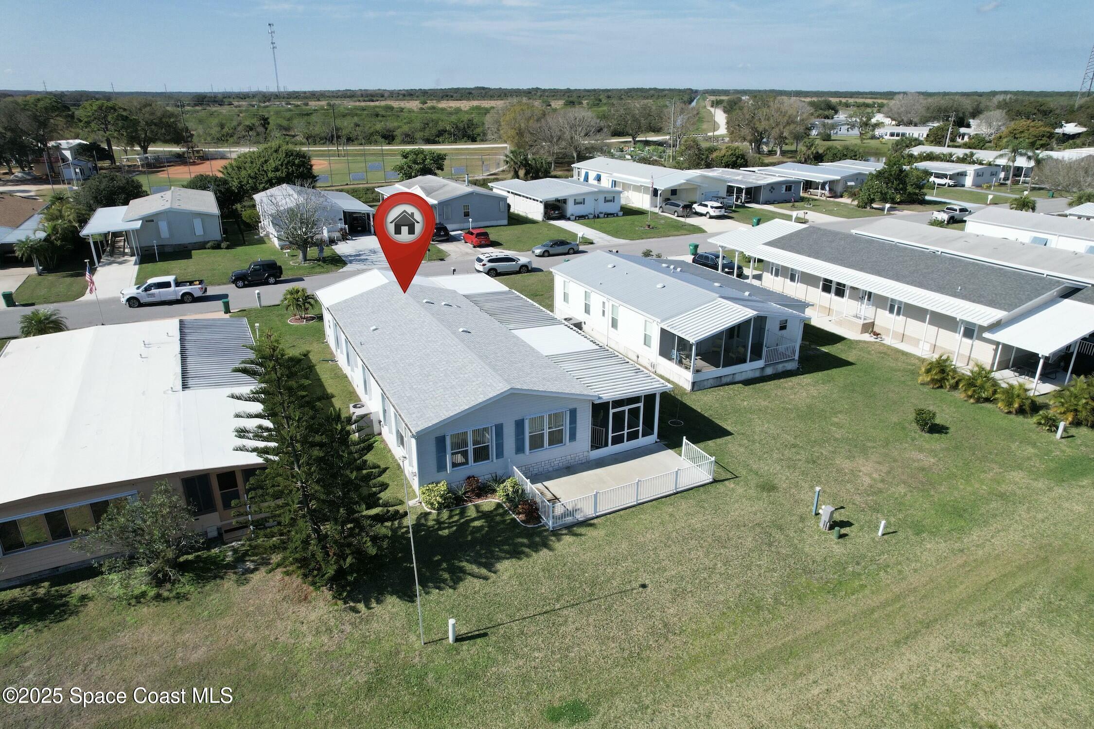 1124 Barefoot Circle Barefoot Bay, FL 32976 - Photo 12 of 79 tempImageQgg4G5