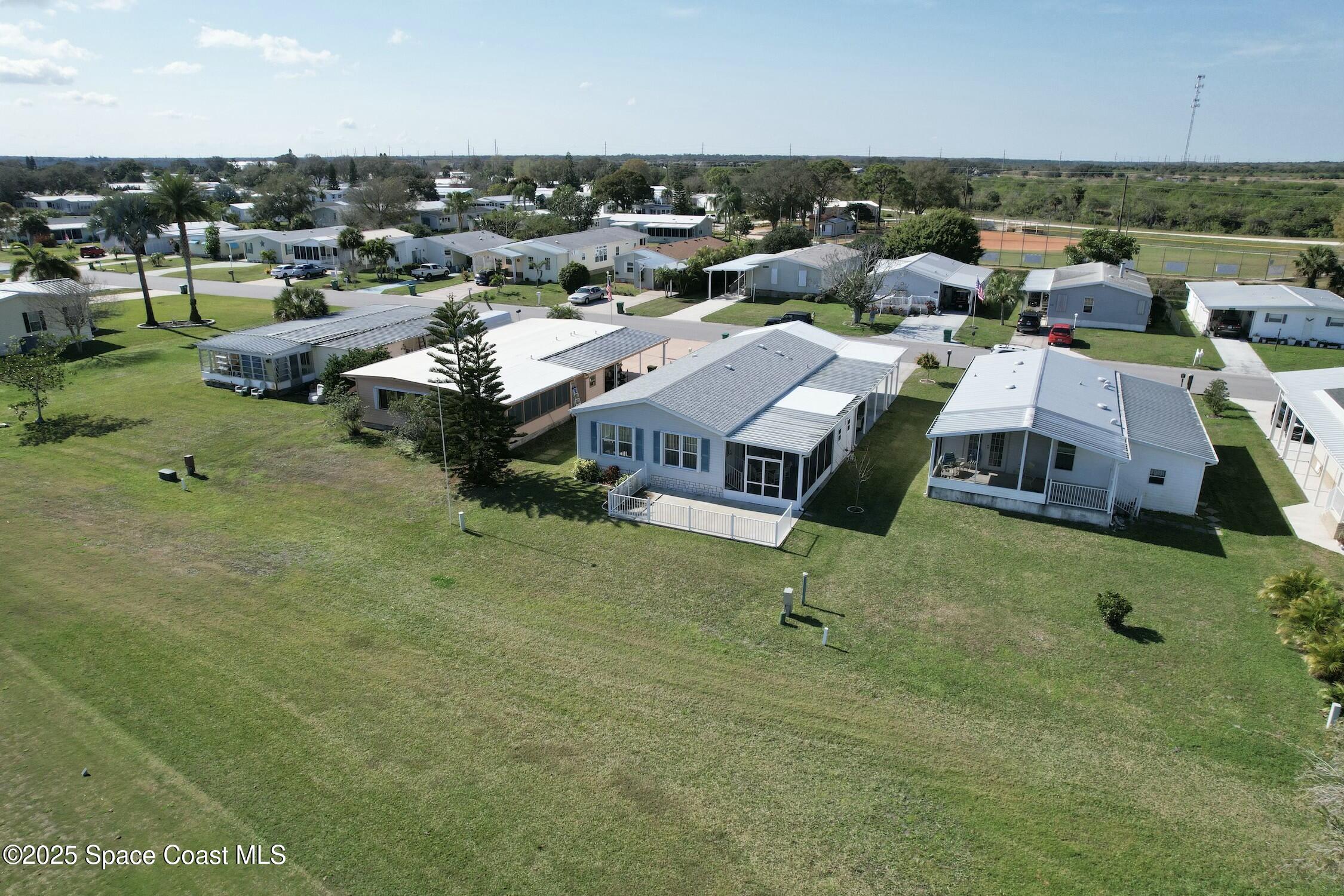 1124 Barefoot Circle Barefoot Bay, FL 32976 - Photo 13 of 79 a picture of city view