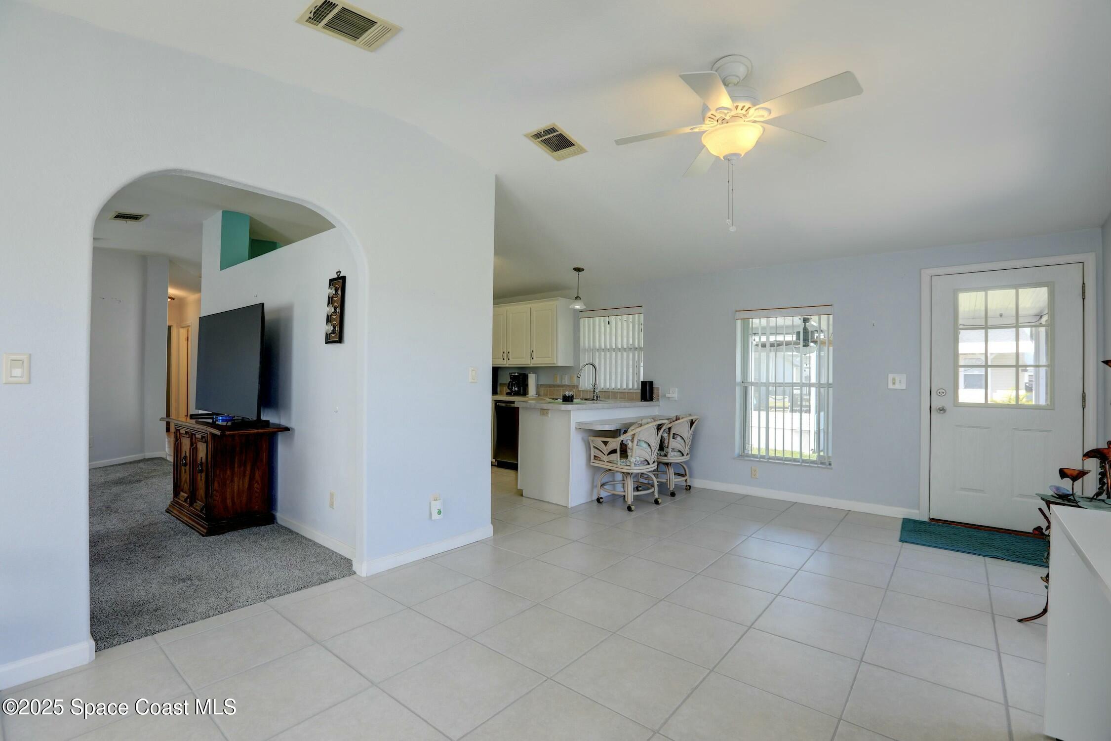 1124 Barefoot Circle Barefoot Bay, FL 32976 - Photo 41 of 79 a view of a livingroom with furniture