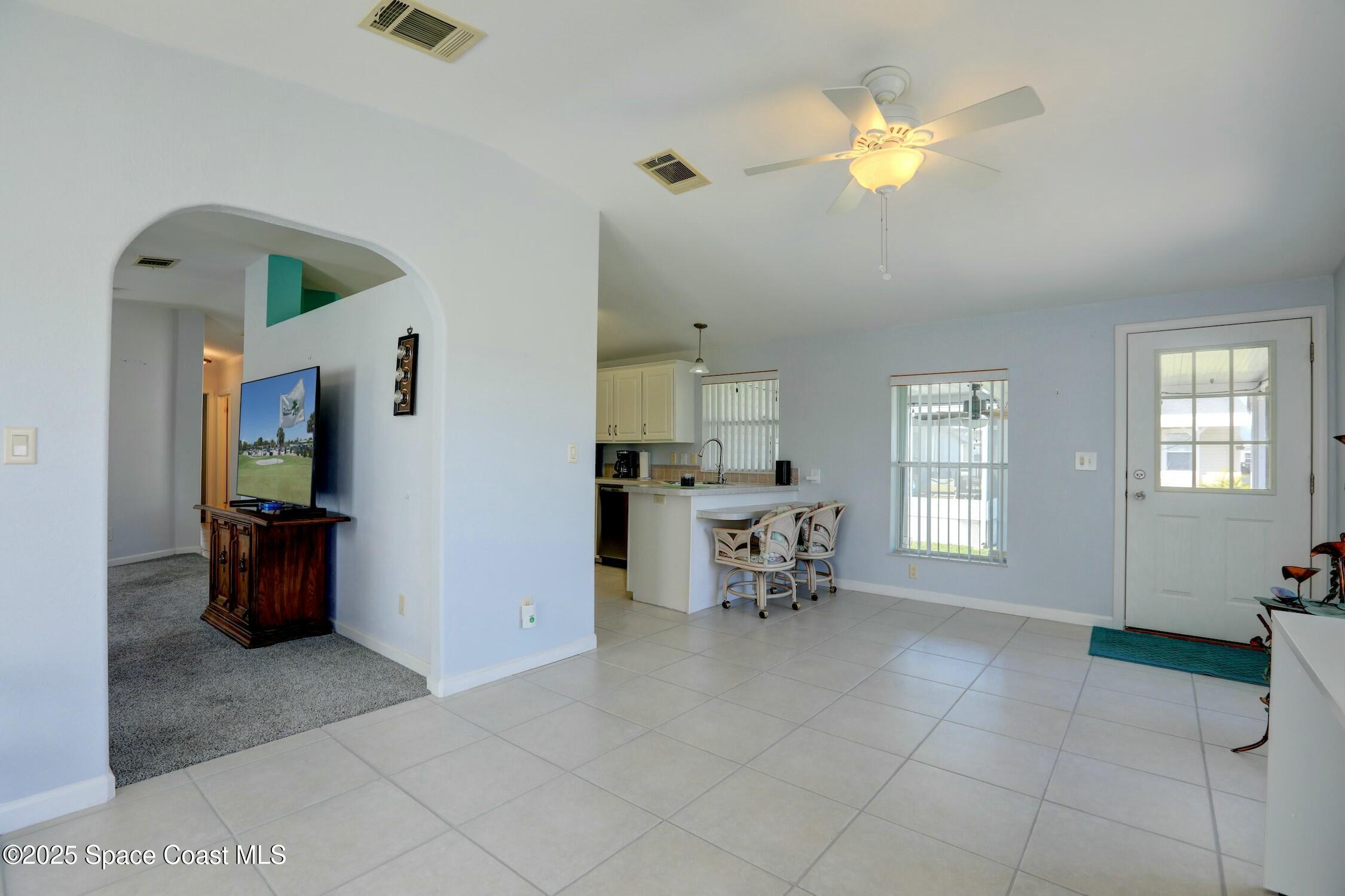 1124 Barefoot Circle Barefoot Bay, FL 32976 - Photo 42 of 79 a view of a livingroom with furniture
