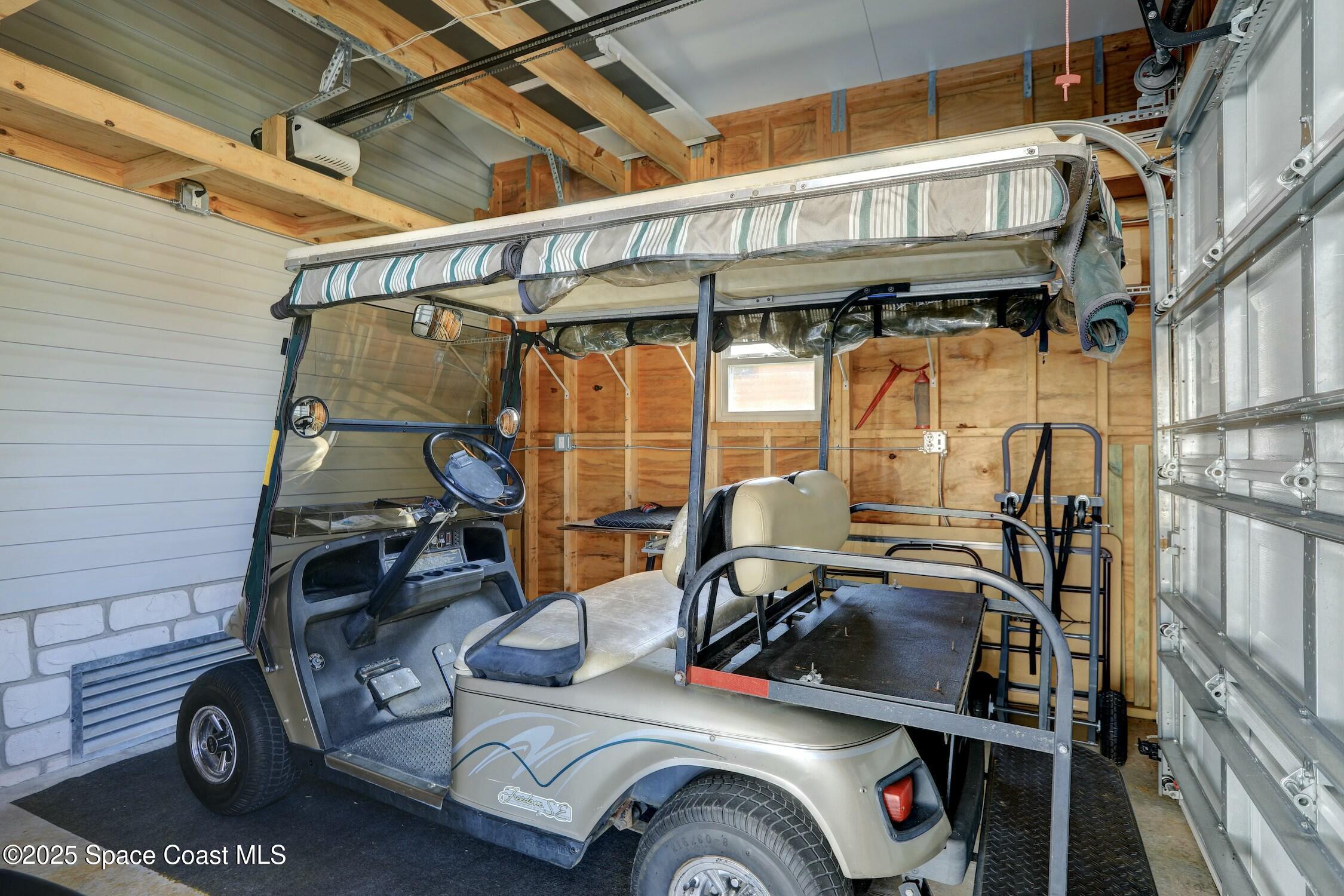 1124 Barefoot Circle Barefoot Bay, FL 32976 - Photo 68 of 79 a view of walk in closet with clothes and shoes