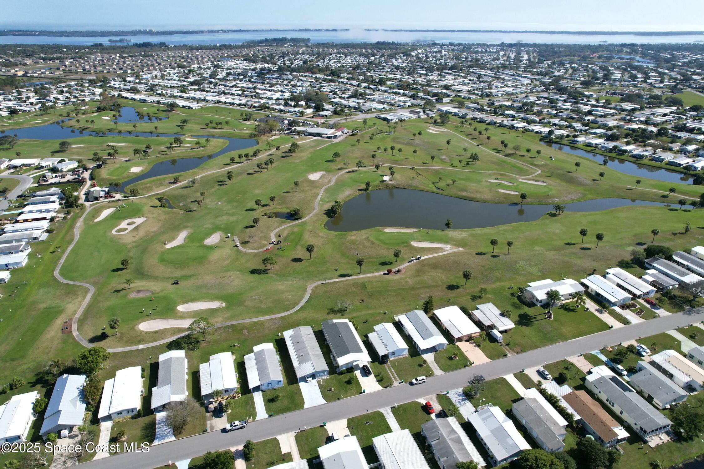 1124 Barefoot Circle Barefoot Bay, FL 32976 - Photo 8 of 79 tempImageLnRPD7