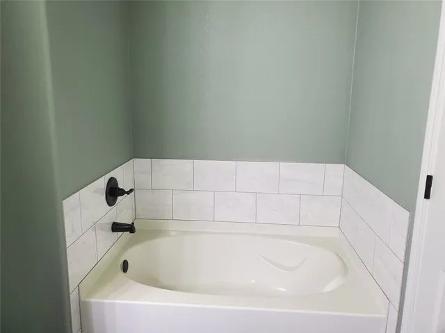 a bathroom with a bathtub