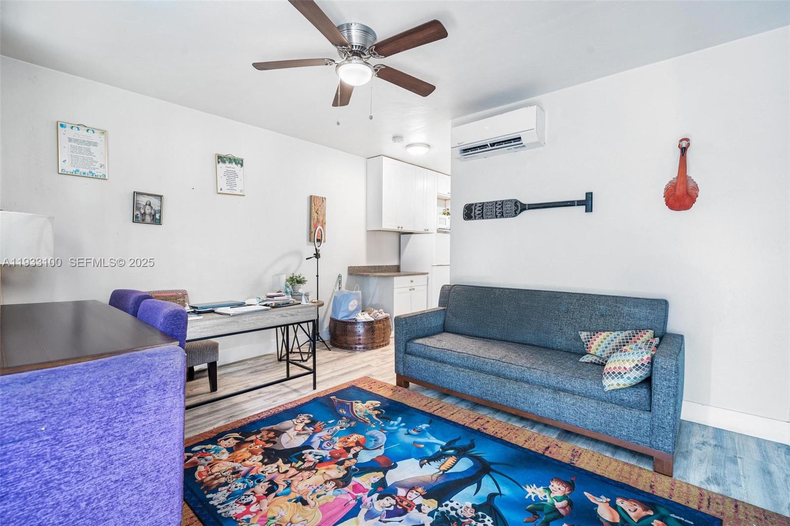 859 Northeast 90th Street Miami, FL 33138 - Photo 17 of 26 a living room with furniture and a rug