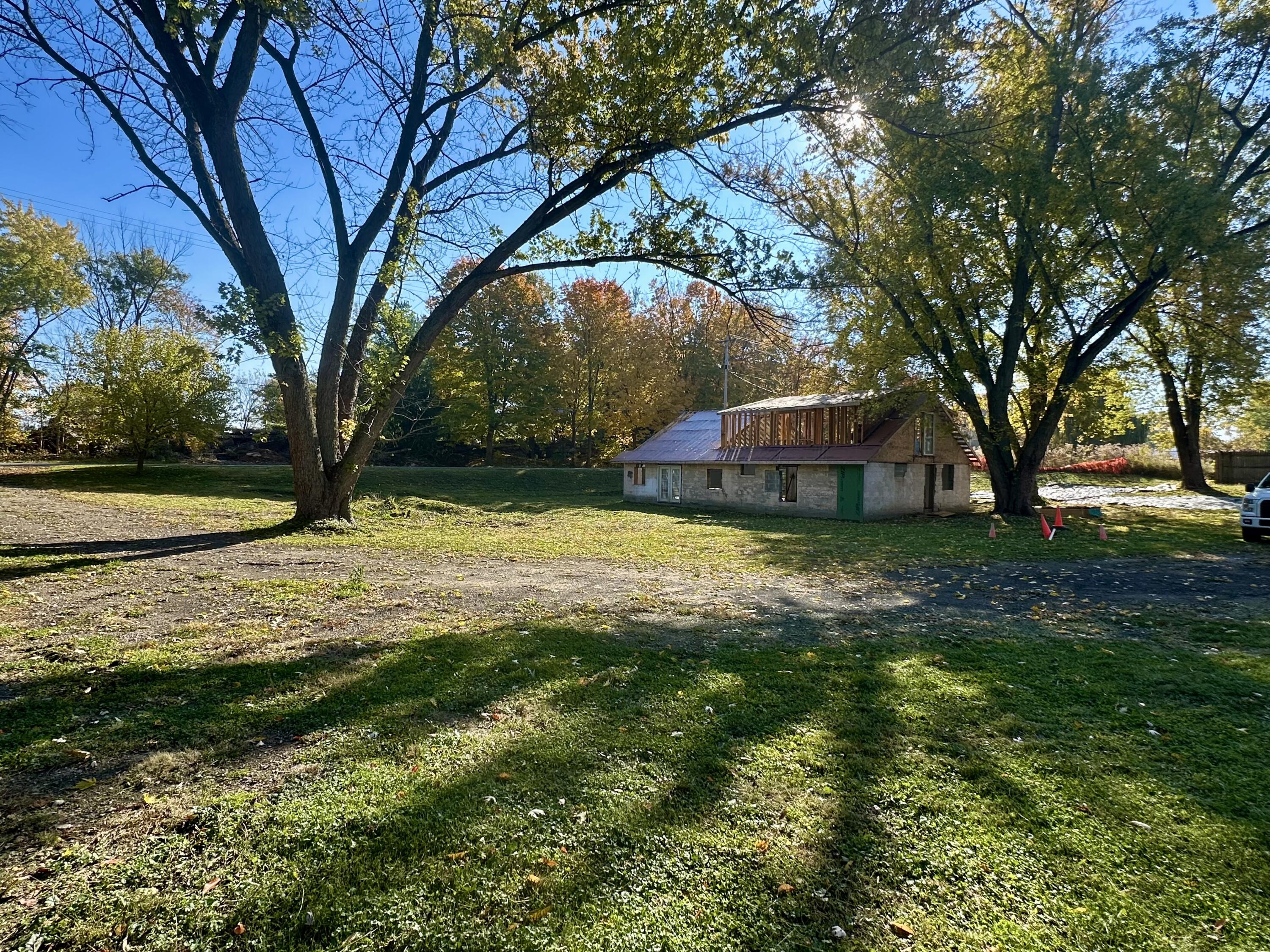 7838 North Walker Road New Carlisle, IN 46552 - Photo 2 of 15 a view of a house with a yard