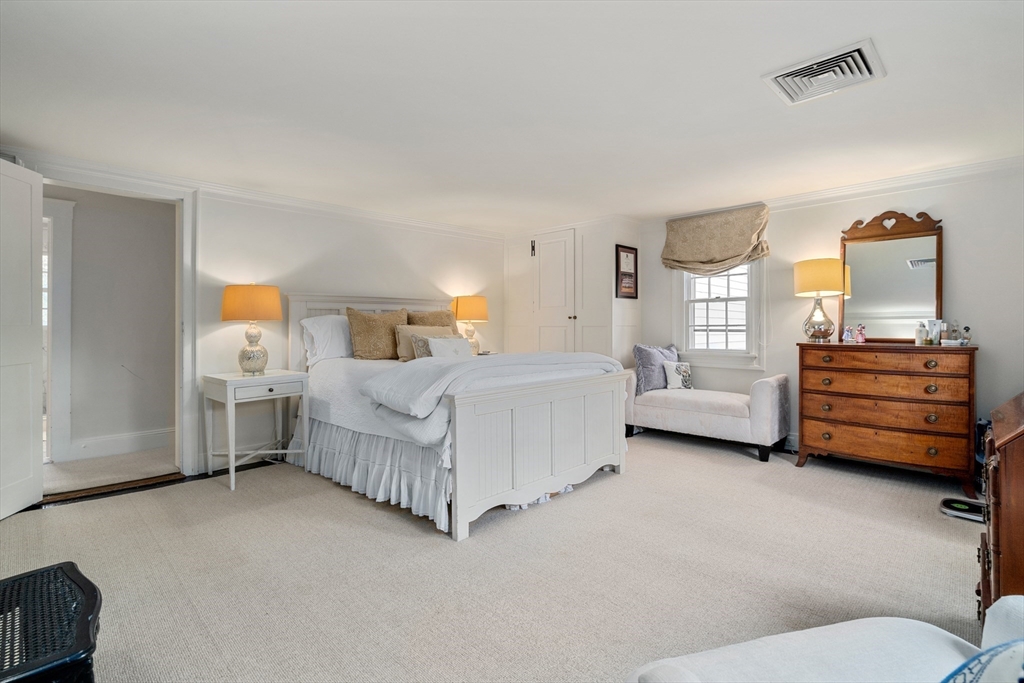 883 High Street Dedham, MA 02026 - Photo 20 of 42 a bedroom with furniture and window