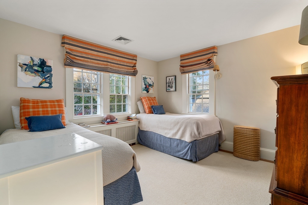 883 High Street Dedham, MA 02026 - Photo 21 of 42 a bedroom with two beds and a couch