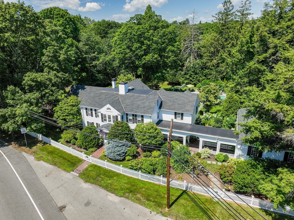 883 High Street Dedham, MA 02026 - Photo 40 of 42 front view of a house with a yard