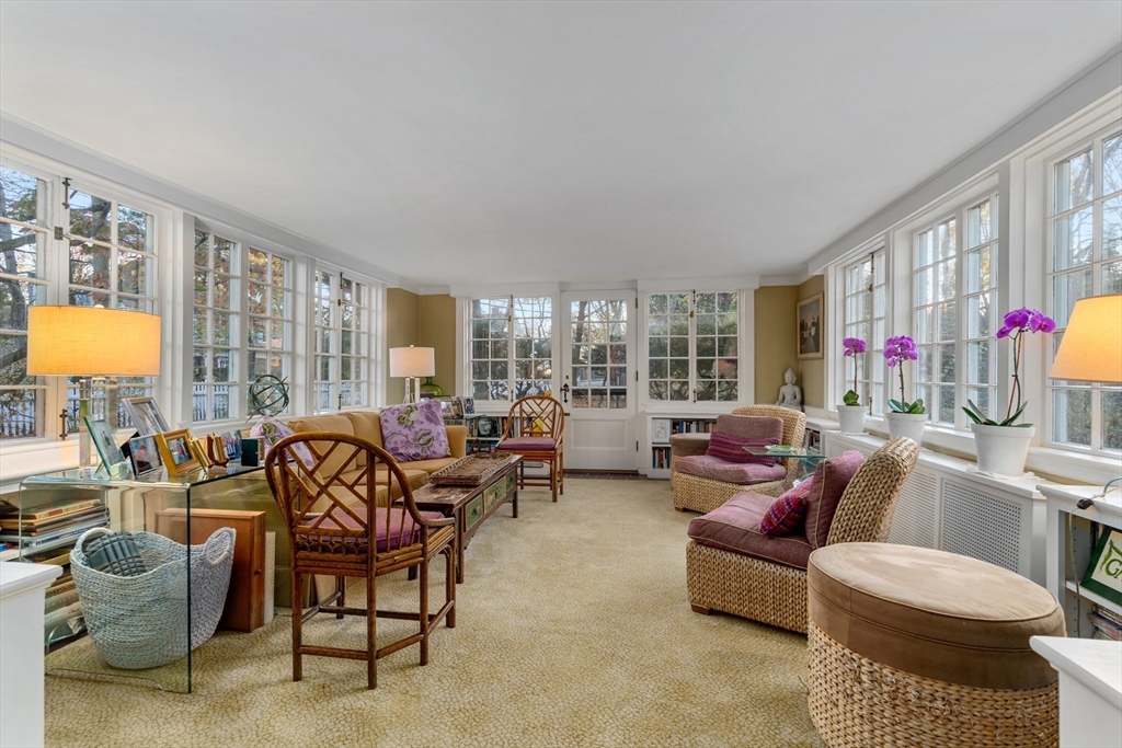 883 High Street Dedham, MA 02026 - Photo 4 of 42 a living room with furniture and a floor to ceiling window