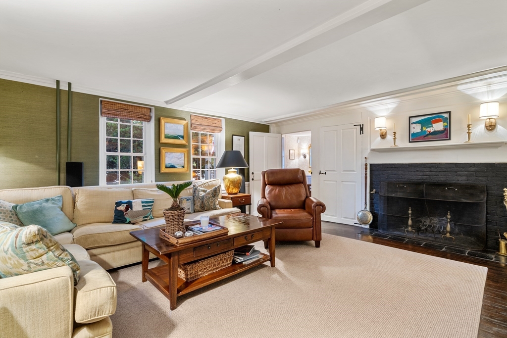 883 High Street Dedham, MA 02026 - Photo 6 of 42 a living room with furniture and a fireplace