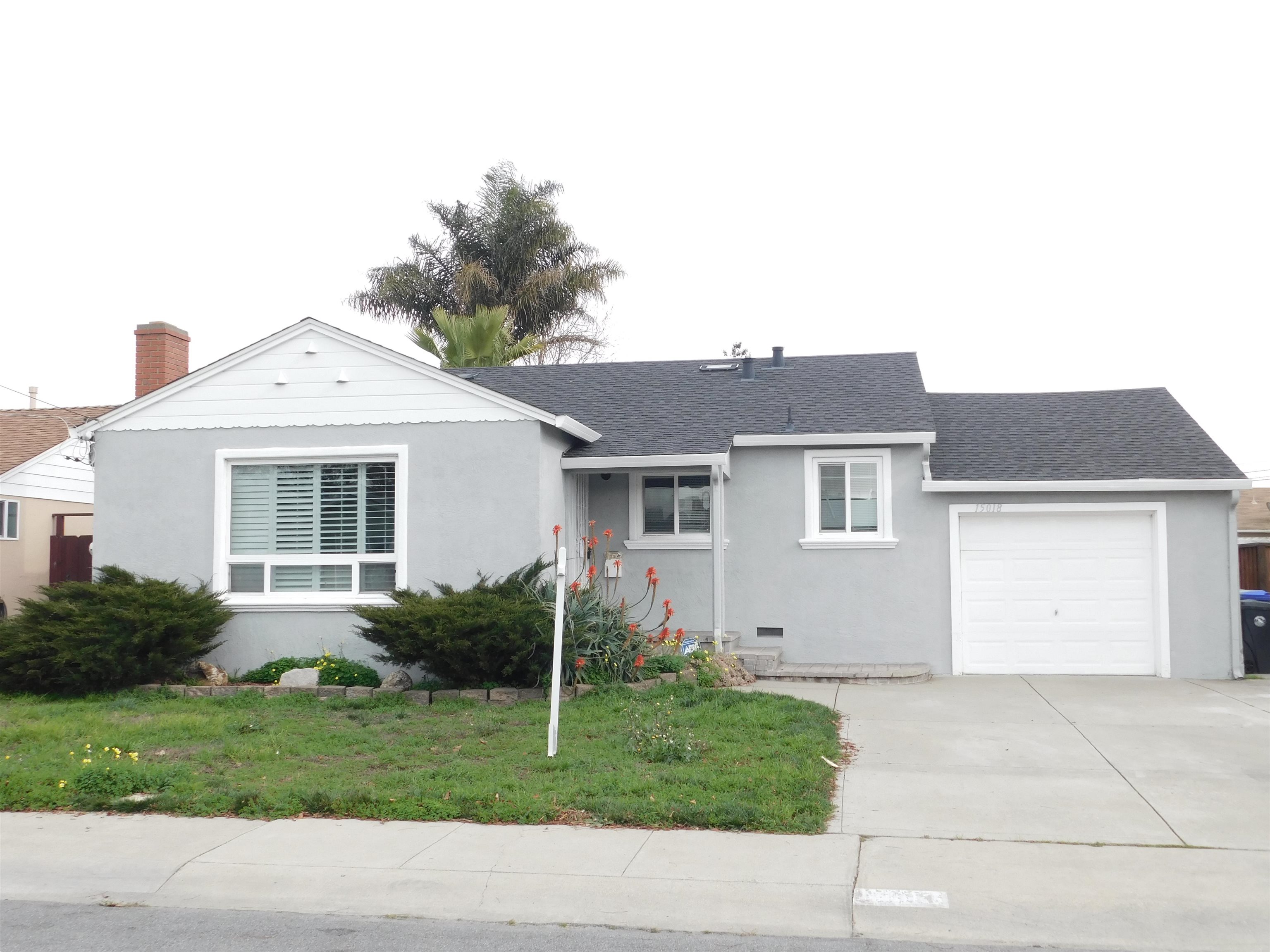 15018 Edgemoor Street San Leandro, CA 94579 - Photo 1 of 13 a view of a yard in front view of a house