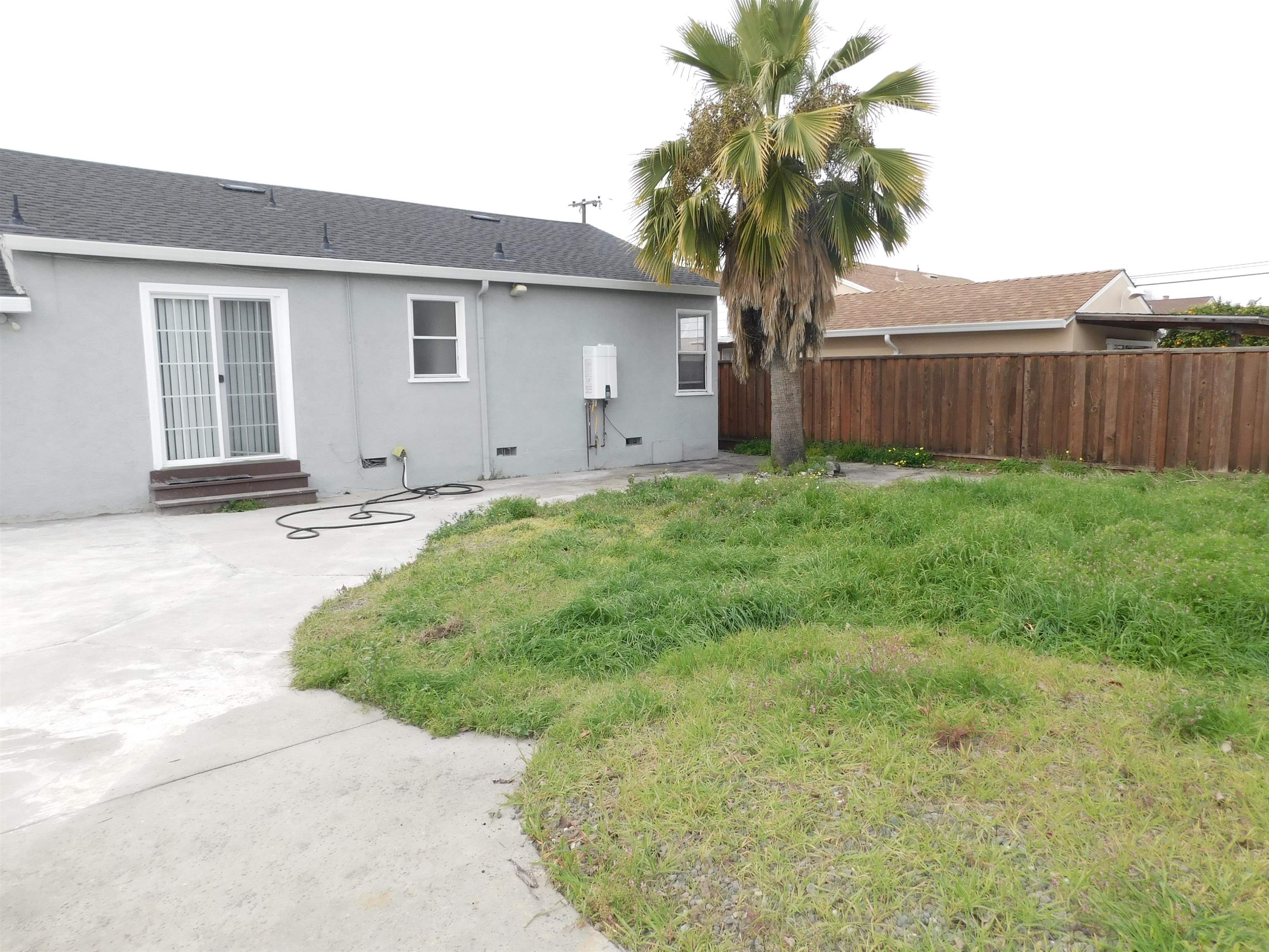 15018 Edgemoor Street San Leandro, CA 94579 - Photo 11 of 13 a house view with a garden space