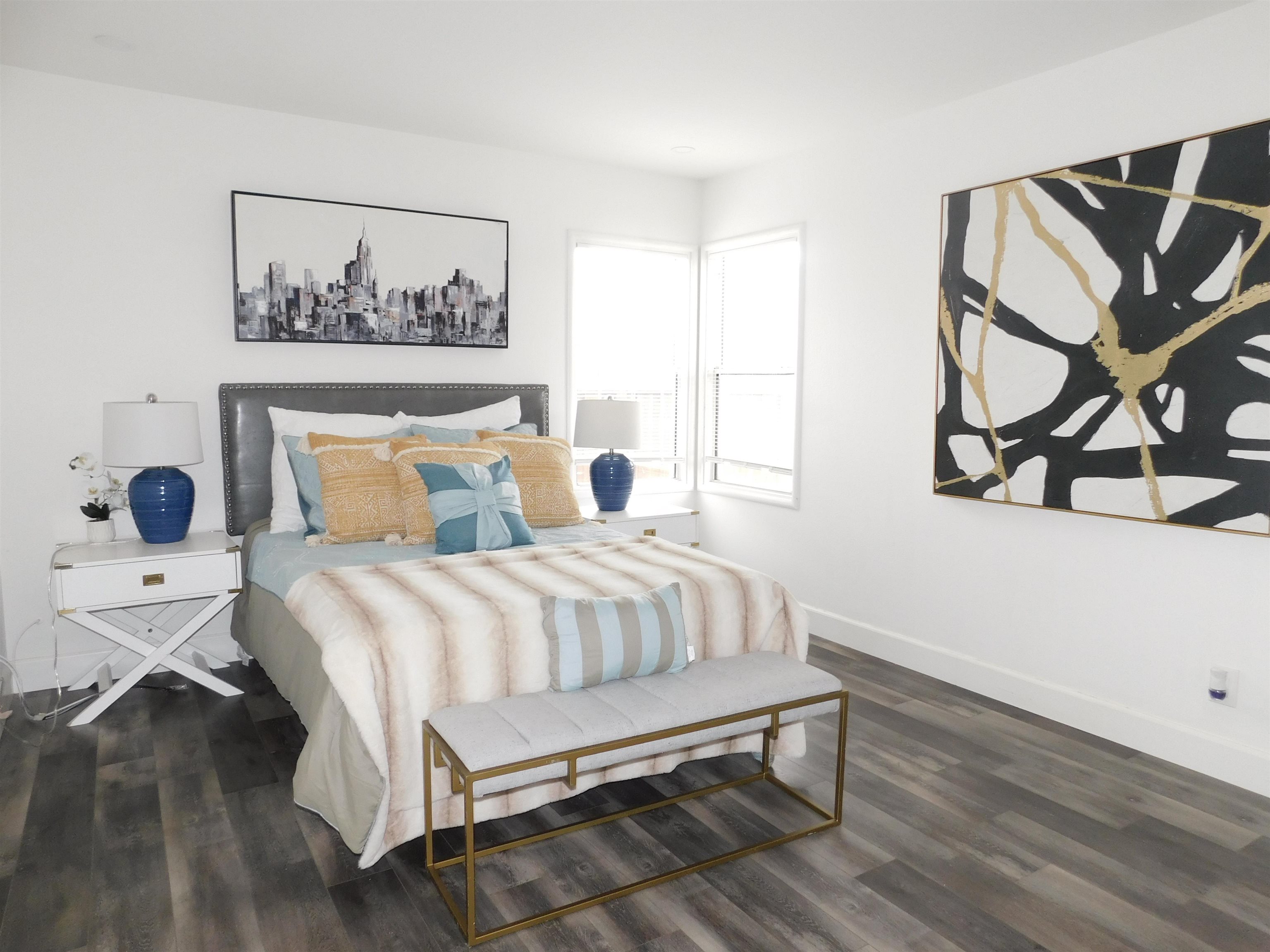 15018 Edgemoor Street San Leandro, CA 94579 - Photo 5 of 13 a bedroom with a bed and painting on the wall